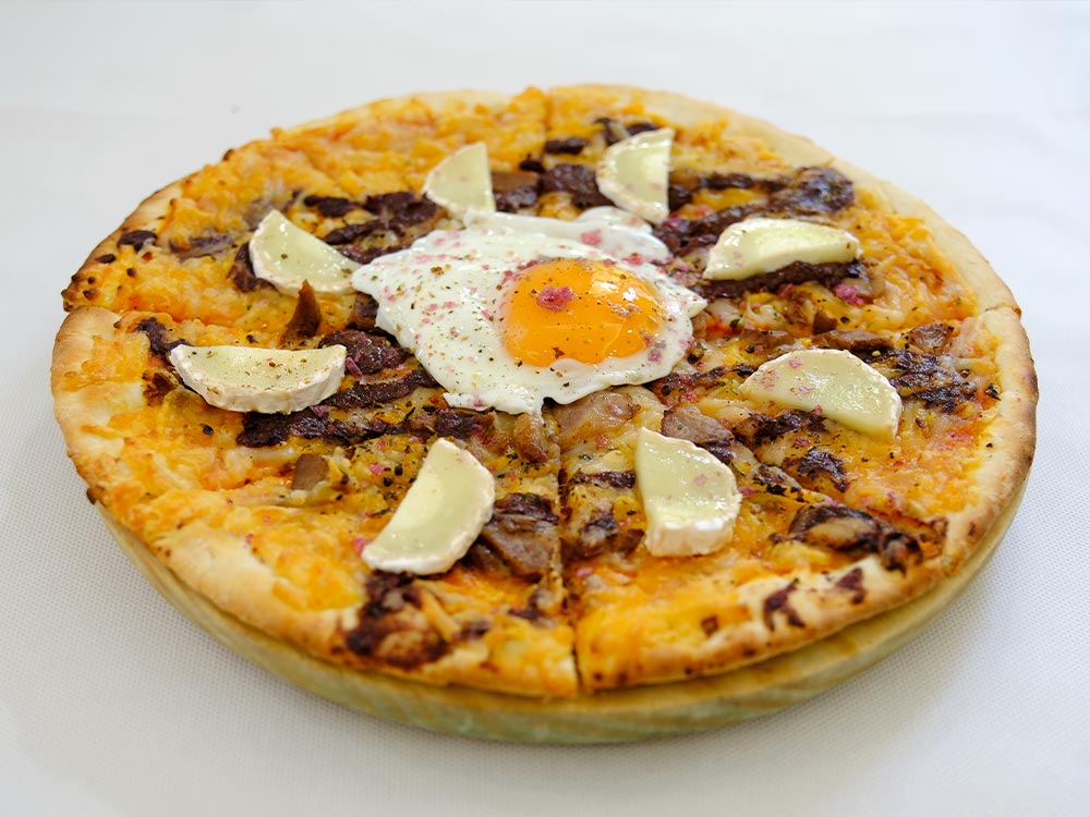 pizza belchitana comer en hotel-oleum